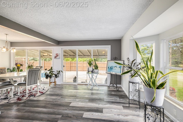 7453 Baldwin Rd, Swartz Creek, MI 48473 - sunroom featuring a chandelier