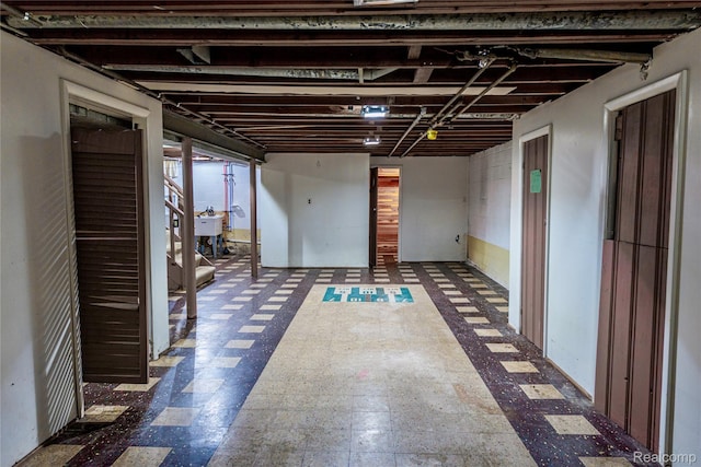 1019 Symes Ct, Royal Oak, MI 48067 - finished basement featuring dark floors and a sink