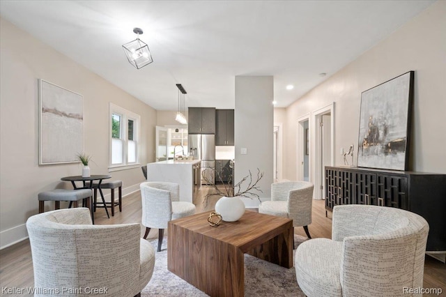 520 Kayser Ave, Birmingham, MI 48067 - living area featuring wood finished floors, baseboards, and recessed lighting