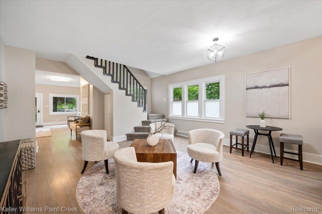 520 Kayser Ave, Birmingham, MI 48067 - living room with stairway, wood finished floors, and plenty of natural light