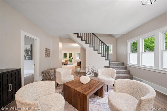 520 Kayser Ave, Birmingham, MI 48067 - living area featuring stairway, baseboards, and wood finished floors