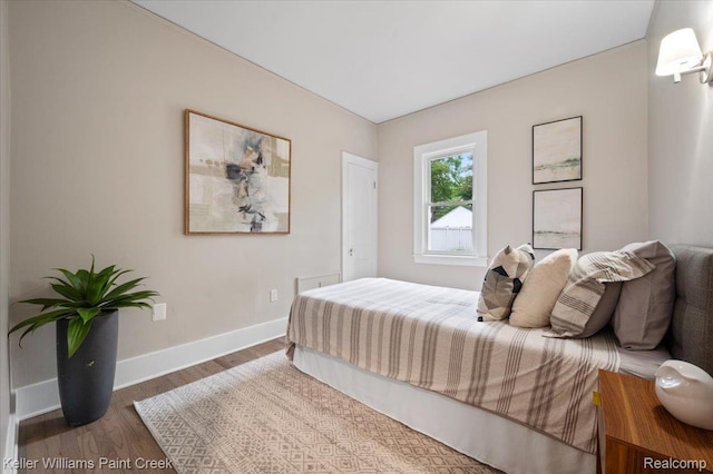 520 Kayser Ave, Birmingham, MI 48067 - bedroom with baseboards and wood finished floors