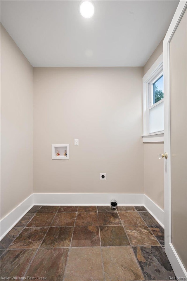 520 Kayser Ave, Birmingham, MI 48067 - laundry room featuring stone tile flooring, baseboards, hookup for an electric dryer, and hookup for a washing machine