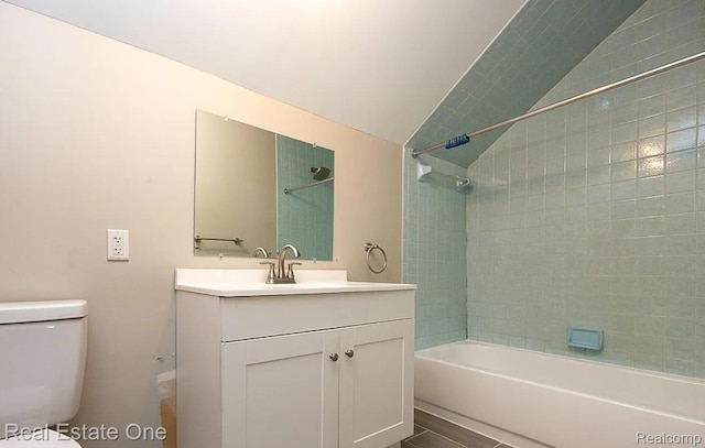 15344 Hartwell St, Dearborn Heights, MI 48227 - bathroom with bathtub / shower combination, vanity, lofted ceiling, and toilet
