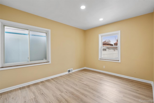 18696 Cherrylawn St, Detroit, MI 48221 - empty room featuring baseboards, wood finished floors, and recessed lighting