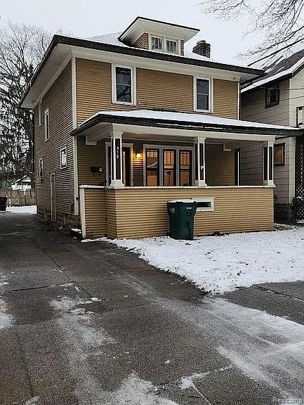 513 W Kilborn St, Lansing, MI 48906 - view of front of home featuring covered porch