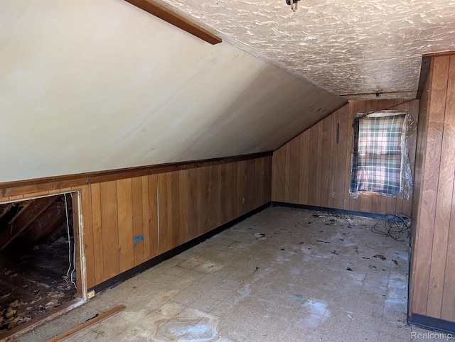 17224 Waveney St, Detroit, MI 48224 - bonus room with wooden walls, vaulted ceiling, and light flooring