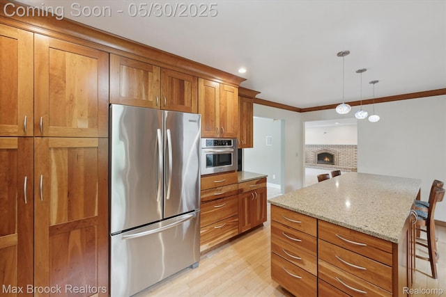 4335 Queens Way, Bloomfield Hills, MI 48304 - kitchen with appliances with stainless steel finishes, brown cabinets, light wood-type flooring, light stone countertops, and ornamental molding