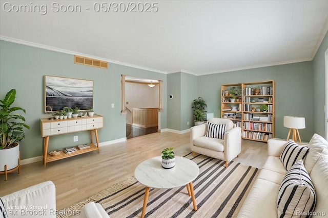 4335 Queens Way, Bloomfield Hills, MI 48304 - living area featuring wood finished floors, crown molding, and baseboards