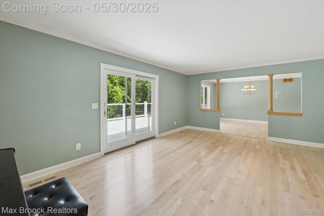 4335 Queens Way, Bloomfield Hills, MI 48304 - unfurnished living room with a chandelier, wood finished floors, crown molding, and baseboards