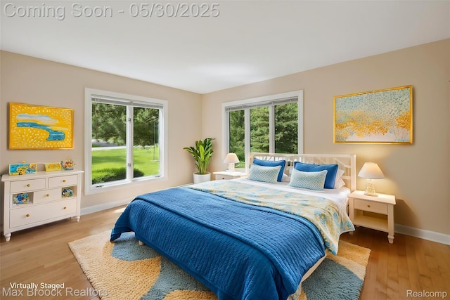 4335 Queens Way, Bloomfield Hills, MI 48304 - bedroom with baseboards and wood finished floors