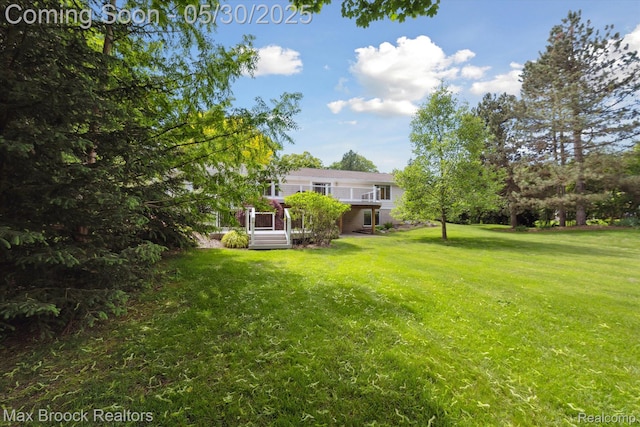 4335 Queens Way, Bloomfield Hills, MI 48304 - view of green lawn with a wooden deck