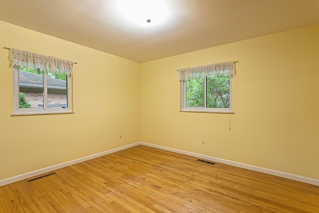 1134 Meadowbrook Ave, Ann Arbor, MI 48103 - empty room featuring baseboards and light wood-style flooring