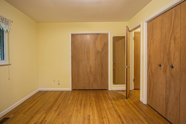 1134 Meadowbrook Ave, Ann Arbor, MI 48103 - unfurnished bedroom with light wood finished floors and baseboards
