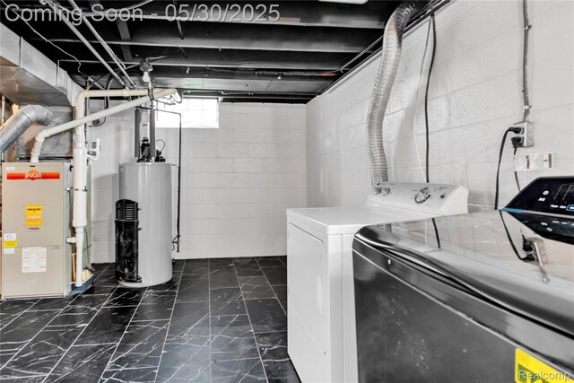 32601 Grinsell Dr, Warren, MI 48092 - laundry room with water heater, washing machine and dryer, and heating unit