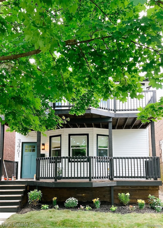 3461 Sheridan St, Detroit, MI 48214 - view of front of house featuring a porch and a balcony