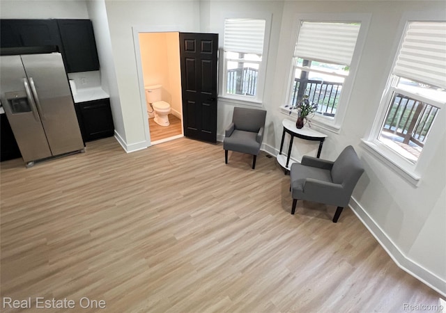 3461 Sheridan St, Detroit, MI 48214 - sitting room featuring light wood-style flooring and baseboards