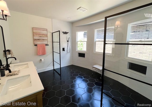3461 Sheridan St, Detroit, MI 48214 - full bathroom featuring double vanity, walk in shower, and tile patterned floors