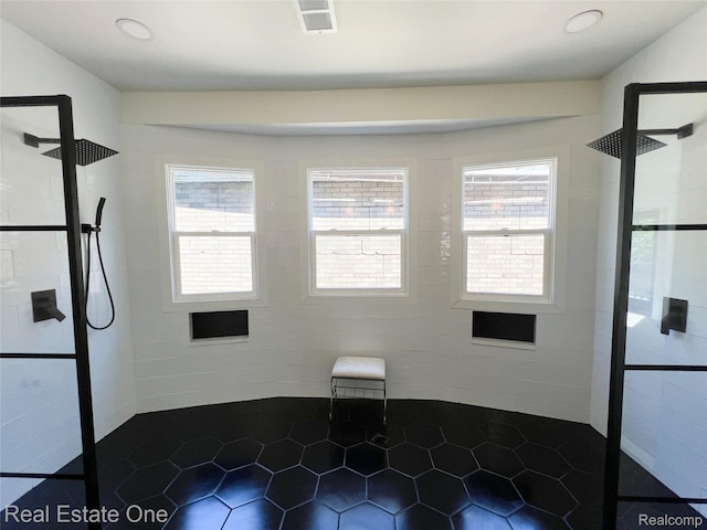 3461 Sheridan St, Detroit, MI 48214 - unfurnished dining area featuring dark tile patterned floors