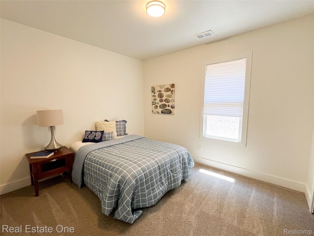 3461 Sheridan St, Detroit, MI 48214 - carpeted bedroom with baseboards
