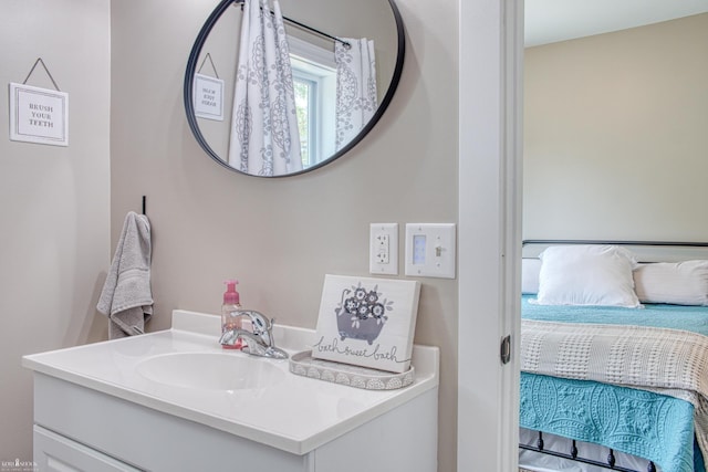 703 W Main St, Durand, MI 48429 - ensuite bathroom featuring vanity