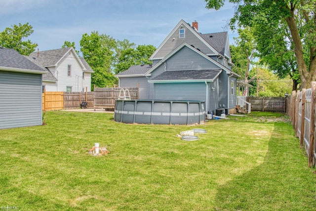 703 W Main St, Durand, MI 48429 - view of yard with cooling unit