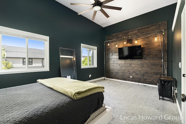 301 NW Xing Unit 25, Holland, MI 49423 - bedroom featuring lofted ceiling, carpet flooring, baseboards, and a ceiling fan
