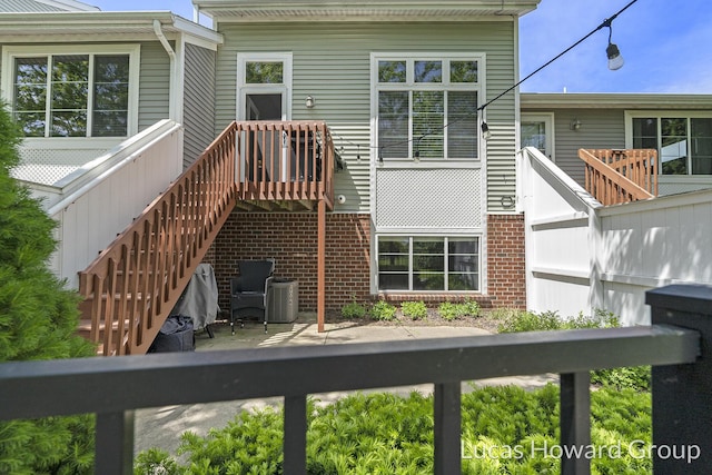 301 NW Xing Unit 25, Holland, MI 49423 - wooden terrace with stairway