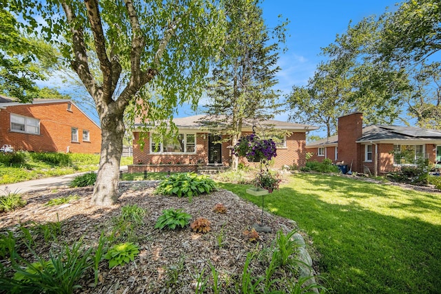 1537 Marian Ave, Ann Arbor, MI 48103 - view of front of home with brick siding and a front lawn