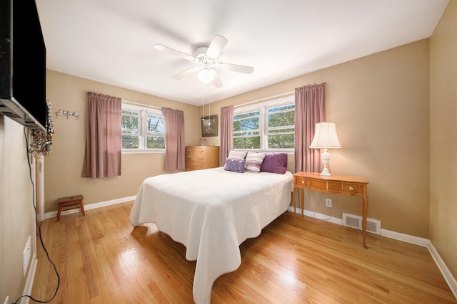1537 Marian Ave, Ann Arbor, MI 48103 - bedroom featuring light wood-style flooring, baseboards, and a ceiling fan