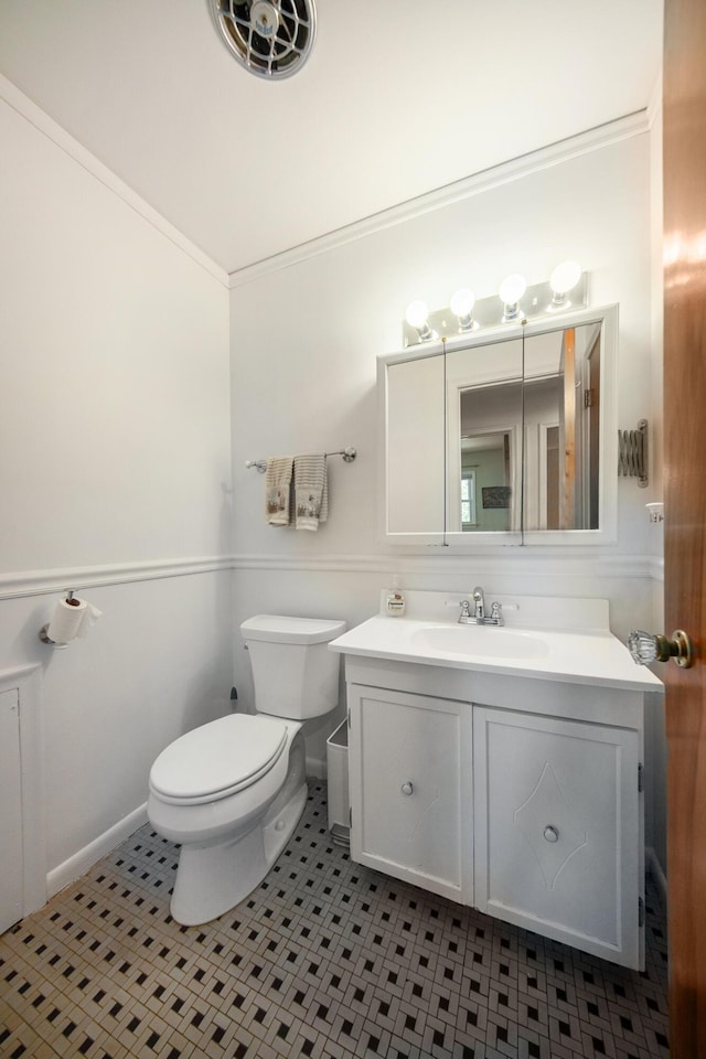 1537 Marian Ave, Ann Arbor, MI 48103 - bathroom with toilet, tile patterned flooring, vanity, and baseboards
