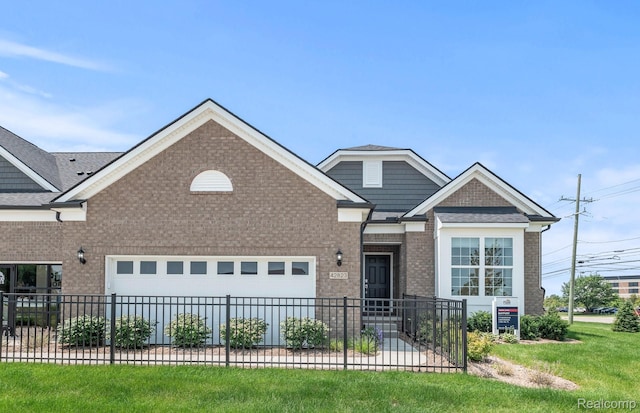 42792 Arbor Dr, Clinton Township, MI 48038 - view of front of property featuring a garage, brick siding, and driveway
