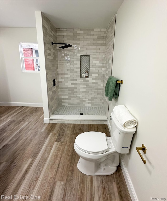 3504 Townsend St, Detroit, MI 48214 - full bath featuring toilet, a stall shower, wood finished floors, and baseboards