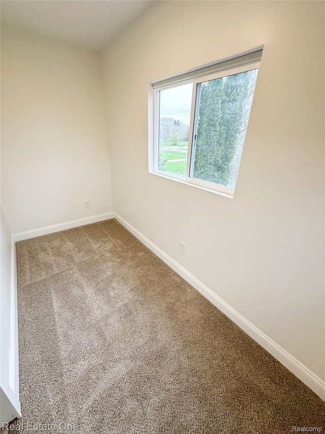 3504 Townsend St, Detroit, MI 48214 - empty room featuring carpet flooring and baseboards
