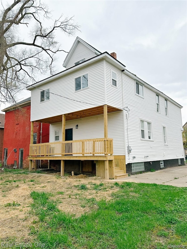 3504 Townsend St, Detroit, MI 48214 - back of property featuring a chimney and a deck