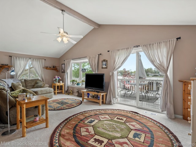 9431 Mandon Rd, White Lake, MI 48386 - carpeted living area featuring ceiling fan, plenty of natural light, beamed ceiling, and high vaulted ceiling