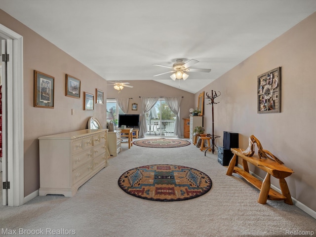 9431 Mandon Rd, White Lake, MI 48386 - carpeted living room with a ceiling fan, vaulted ceiling, and baseboards