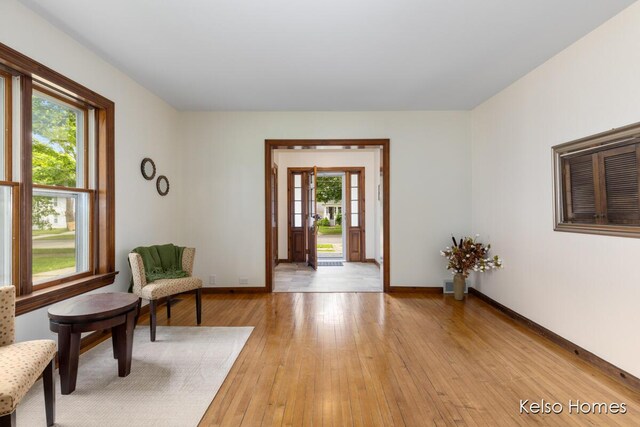 510 Division St, Big Rapids, MI 49307 - sitting room featuring light wood-style floors and baseboards