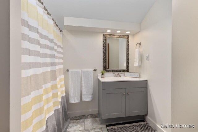 510 Division St, Big Rapids, MI 49307 - full bath with vanity and baseboards