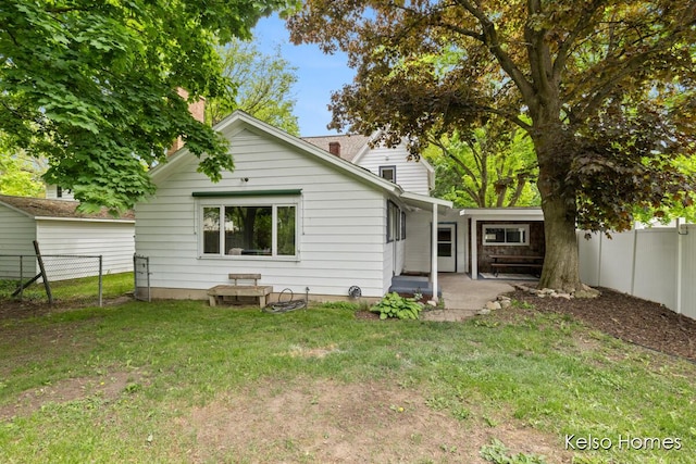 510 Division St, Big Rapids, MI 49307 - back of house with a patio area