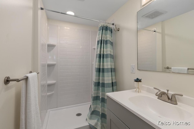 510 Division St, Big Rapids, MI 49307 - full bathroom with curtained shower and vanity