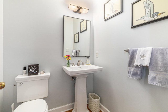 1336 Coventry Square Dr, Ann Arbor, MI 48103 - half bath with toilet and baseboards