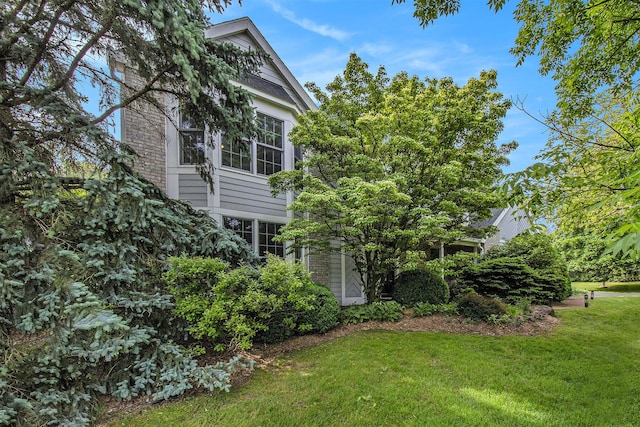 1336 Coventry Square Dr, Ann Arbor, MI 48103 - view of side of property with a yard