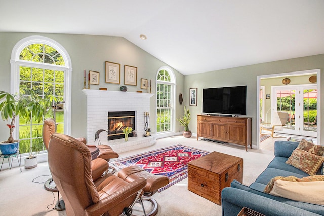 1336 Coventry Square Dr, Ann Arbor, MI 48103 - living room with carpet floors, lofted ceiling, and a fireplace