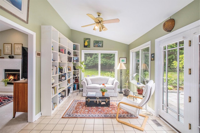 1336 Coventry Square Dr, Ann Arbor, MI 48103 - sunroom / solarium featuring lofted ceiling, plenty of natural light, and tile patterned floors