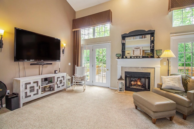 5886 Augusta Ln, Grand Blanc, MI 48439 - carpeted living room with a high ceiling and a multi sided fireplace