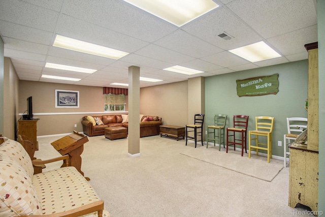 5886 Augusta Ln, Grand Blanc, MI 48439 - carpeted living room with a drop ceiling and baseboards