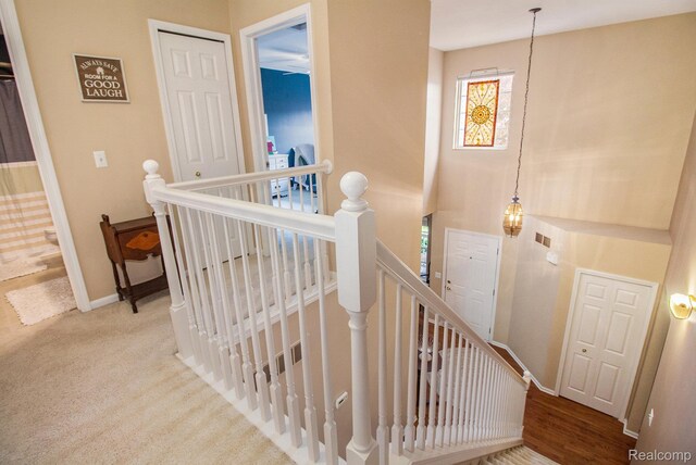 5886 Augusta Ln, Grand Blanc, MI 48439 - stairway featuring baseboards