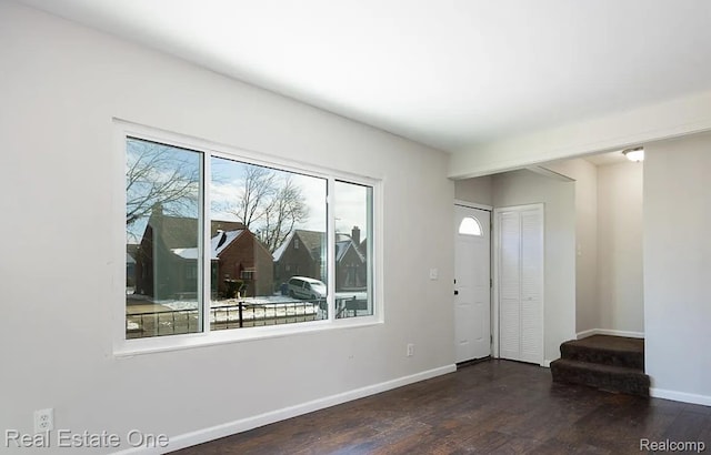 15827 Tracey St, Detroit, MI 48227 - entrance foyer with wood finished floors, stairway, and baseboards