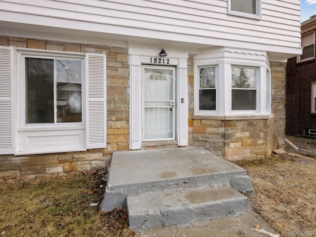 18212 Sorrento St, Detroit, MI 48235 - property entrance with stone siding